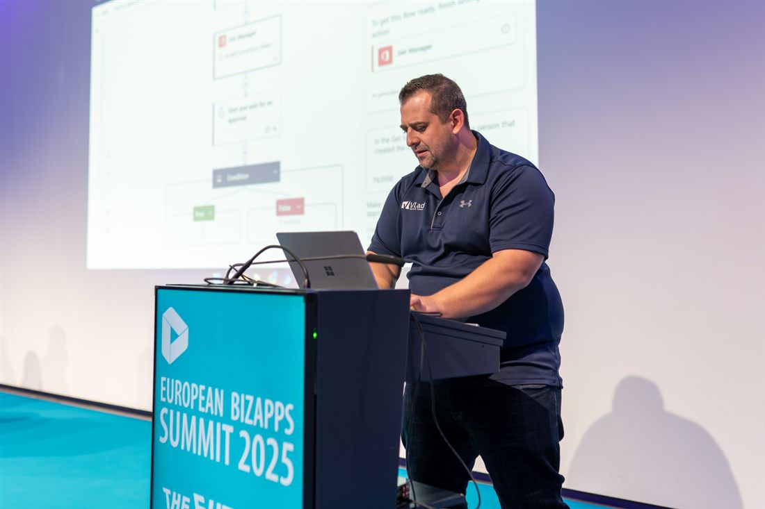 Vlad Catrinescu presenting on stage at the European Collaboration Summit